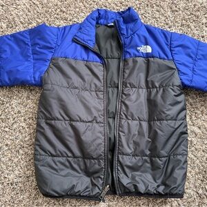 The North Face Kids Black and Blue Puffer Jacket